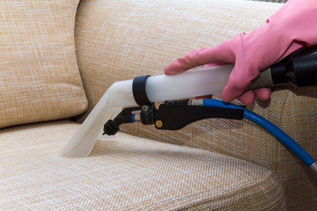 Sofa Or Armchair Chemical Cleaning With Royalty Free Image 1644535688 1